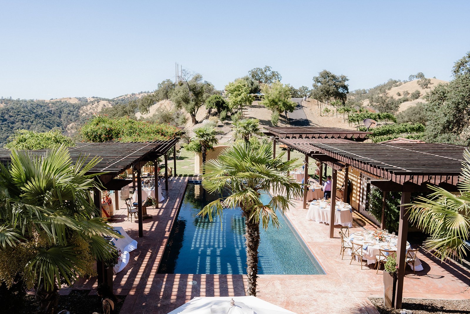 La Piscina poolside welcome party area at Airola Road Vineyards in Angels Camp, California