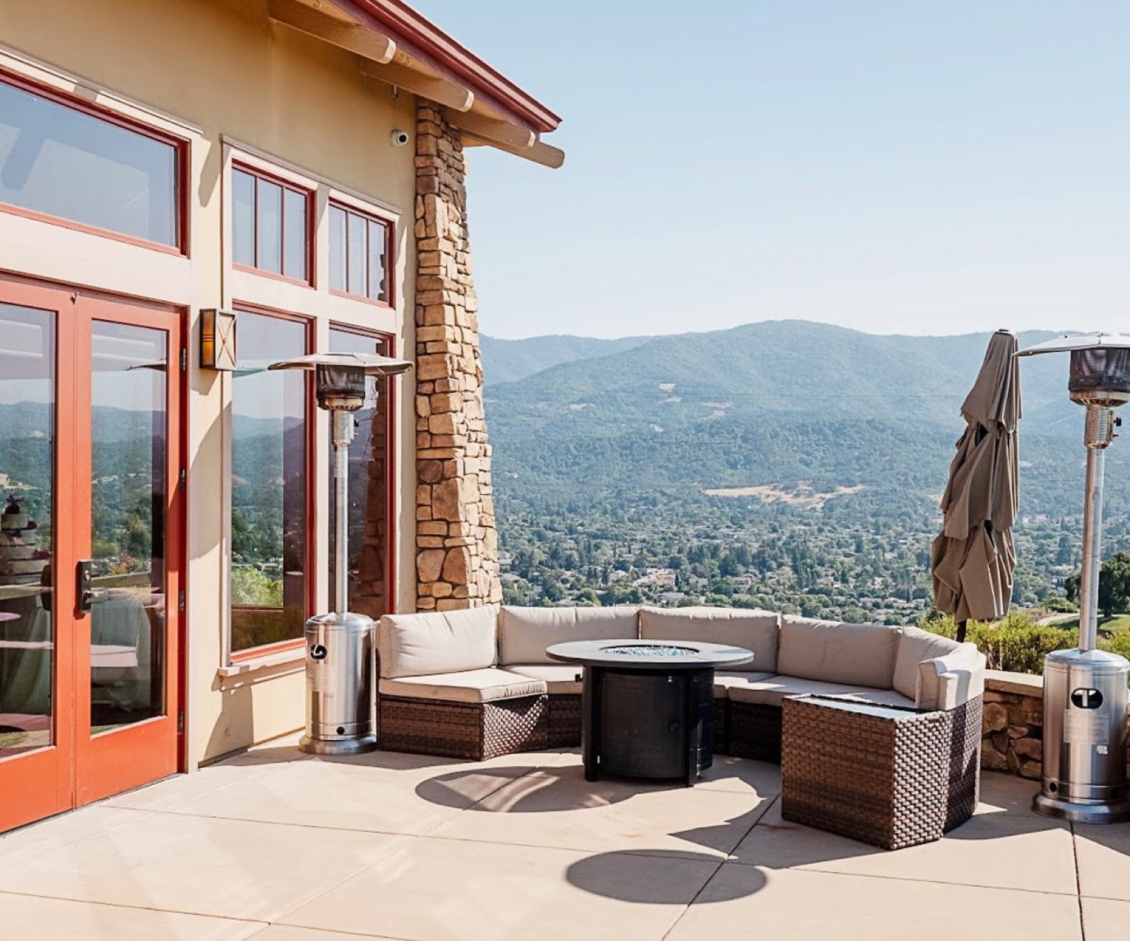 Cocktail patio with lounge furniture and valley views at Boulder Ridge by Wedgewood Weddings in San Jose, CA