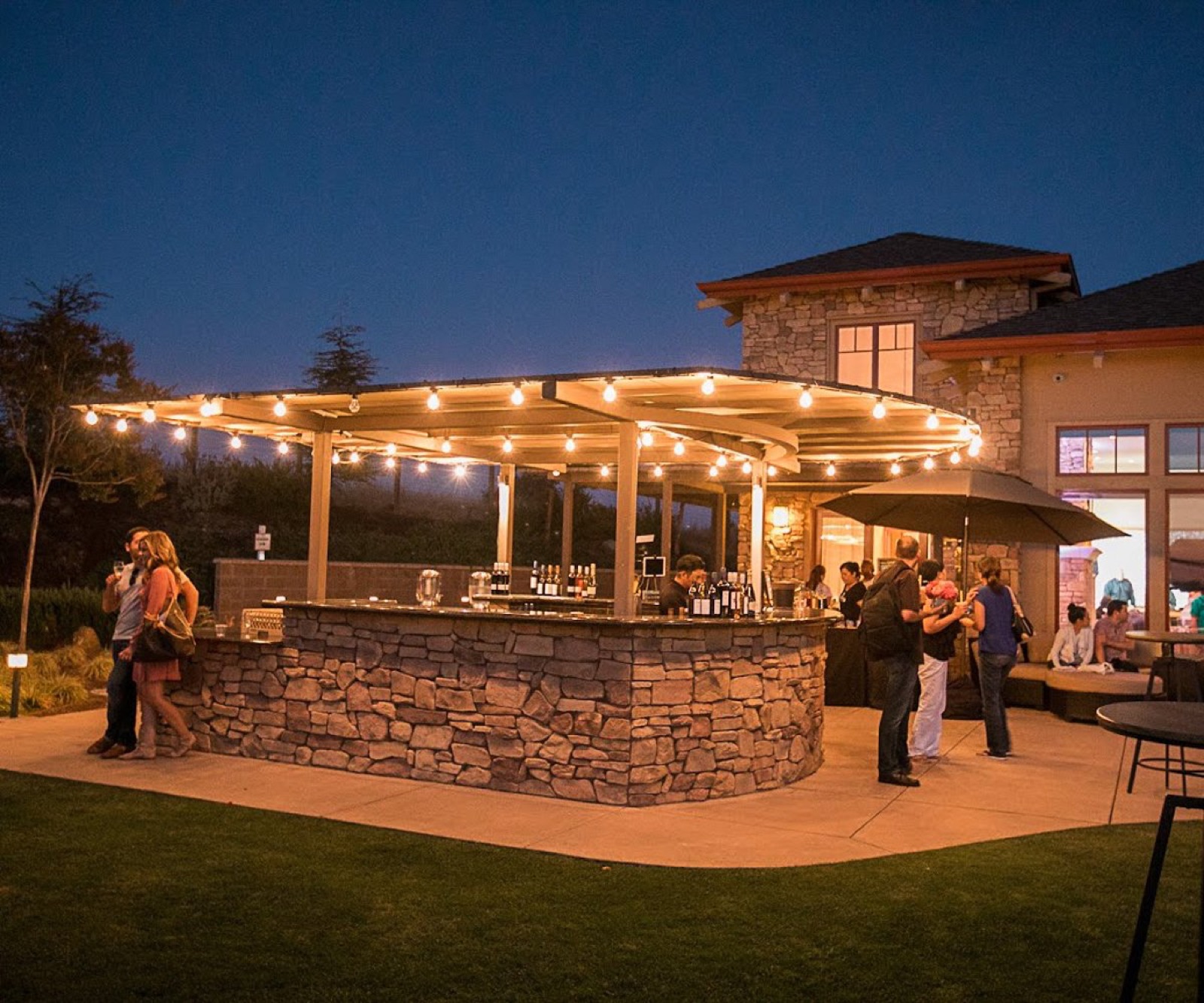 Nighttime cocktail hour on the patio at Boulder Ridge by Wedgewood Weddings in San Jose, CA