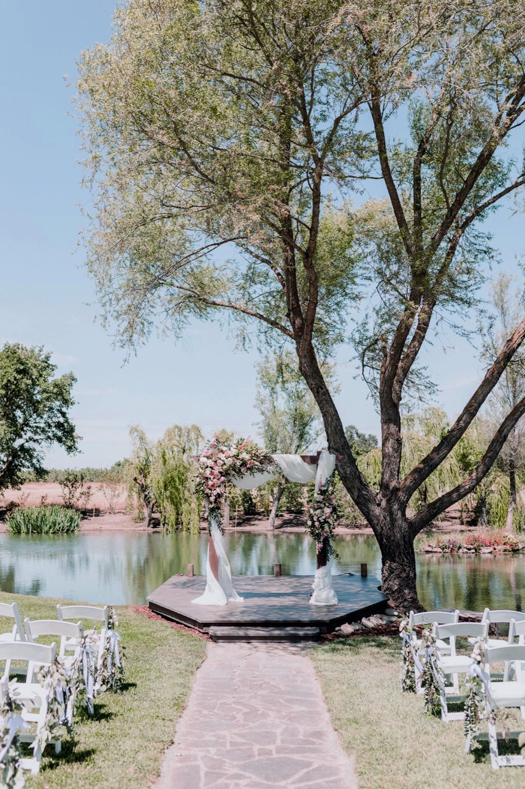 Open farmland grounds and trees at Bridgewood Events wedding venue in Galt, California