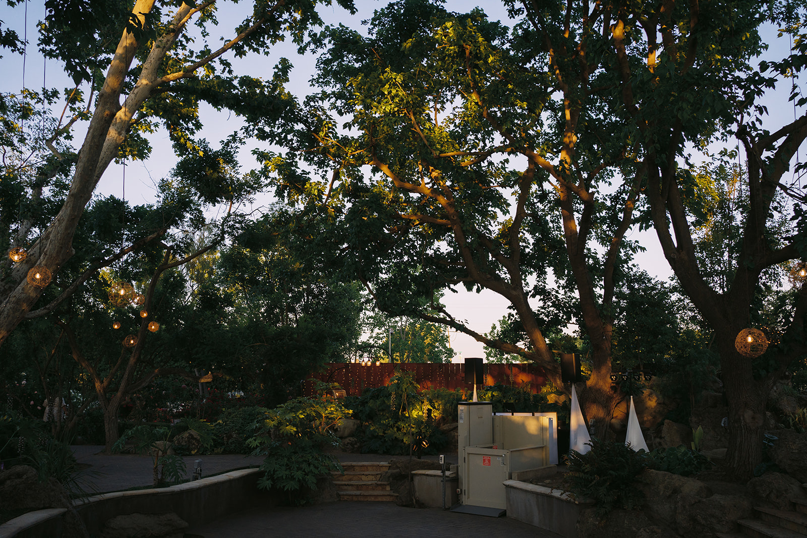 Elegant garden wedding setting with string lights at Brownstone Gardens in Oakley, California