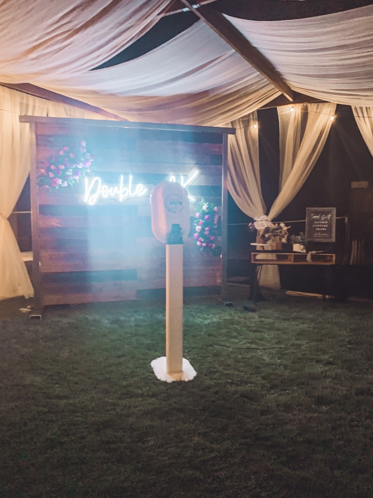 Corral photo booth with rustic backdrop by Burner Custom Designs and Events in Hilmar, California