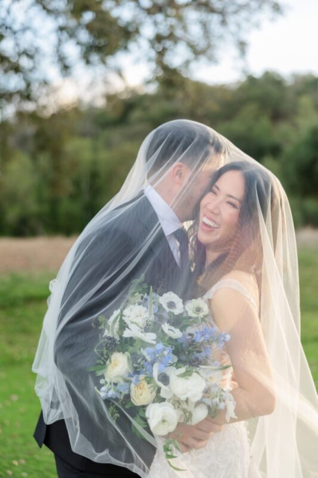 Indoor wedding reception with floor-to-ceiling windows at Cinnabar Hills Golf Club, San Jose