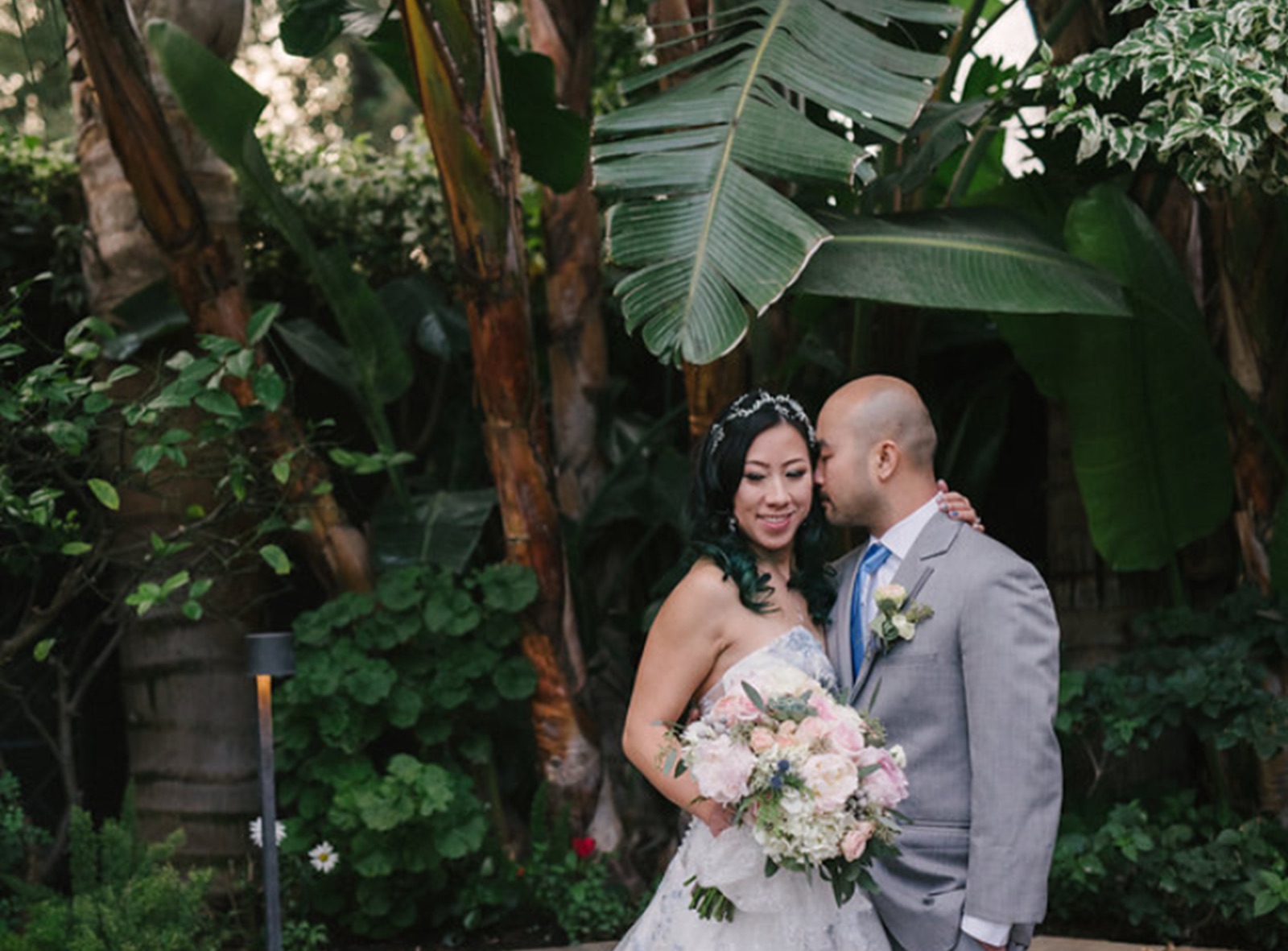 Newlywed couple on the patio at Club Auto Sport wedding venue in San Jose, California