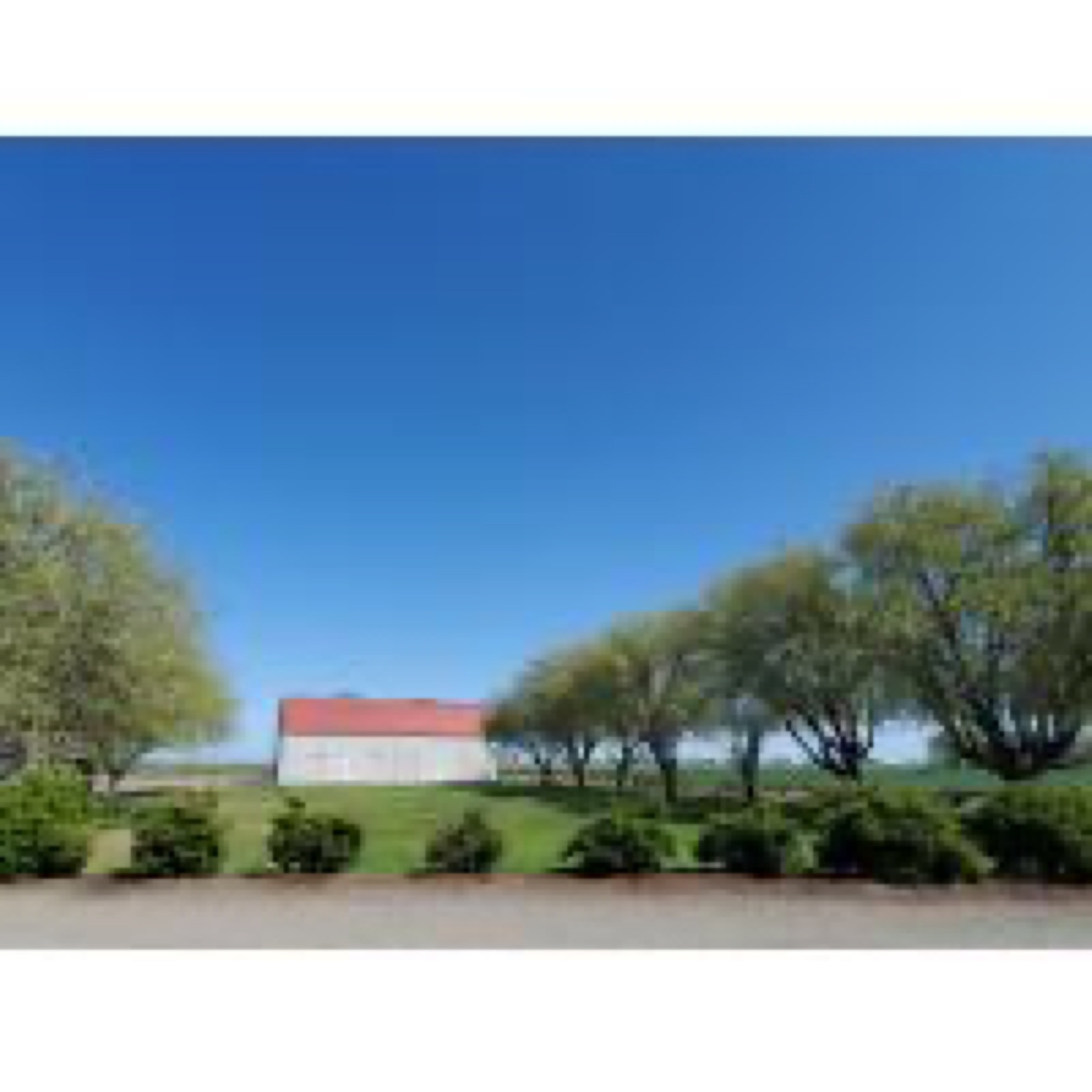 Manicured lawns and country grounds at Cotton Tree Ranch in Dos Palos, California