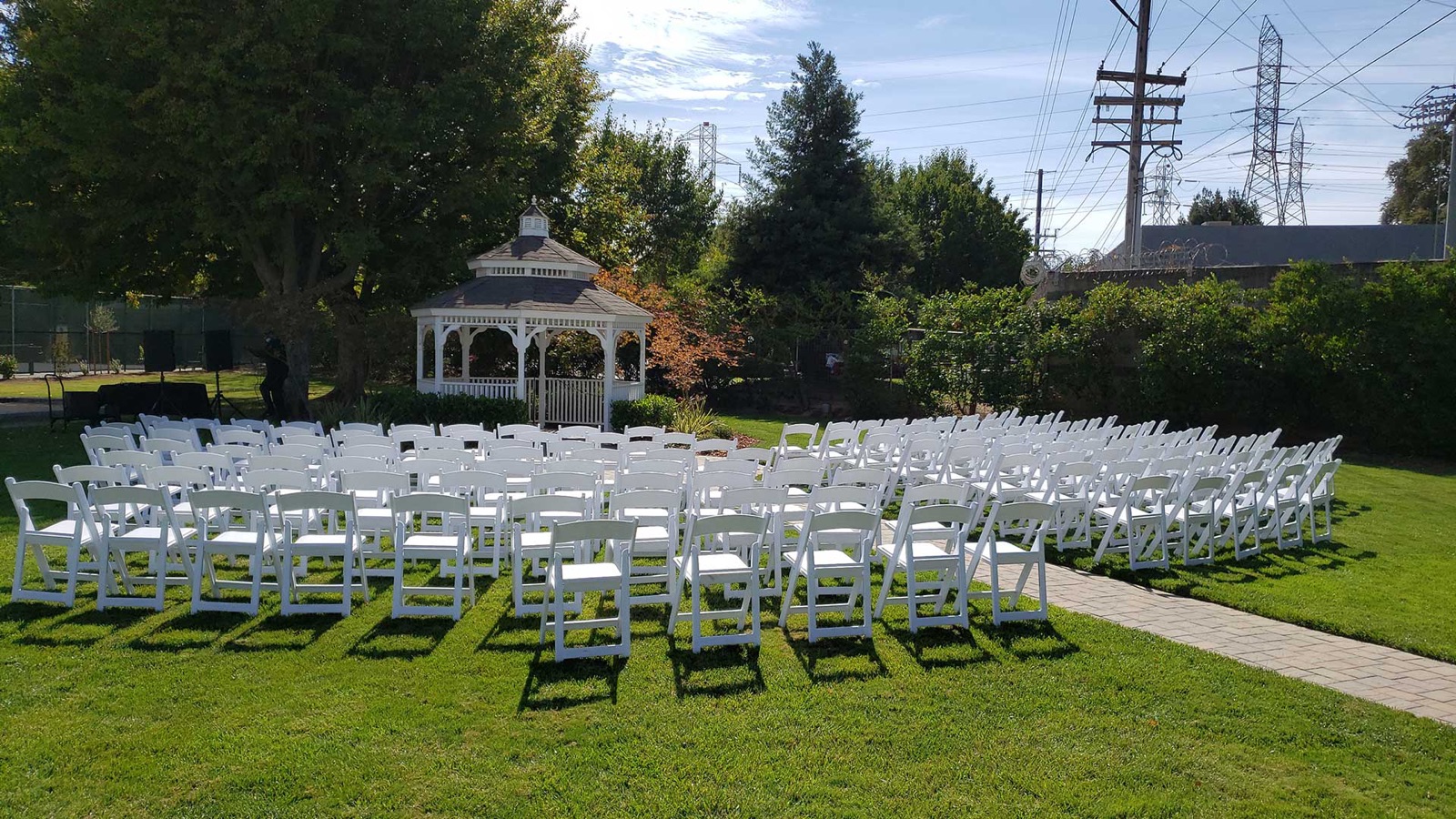 Outdoor garden gazebo wedding ceremony setup at Dante Event Center in Sacramento, California