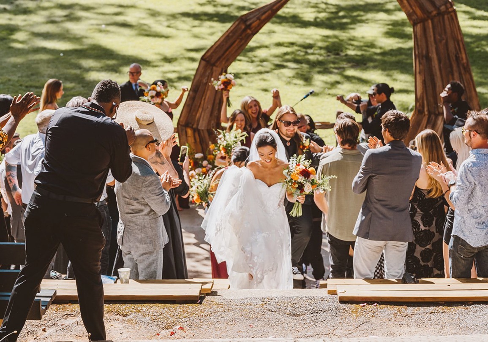 Bride's procession at the Base Camp amphitheater at Deloro Valley wedding venue in Tuolumne, California