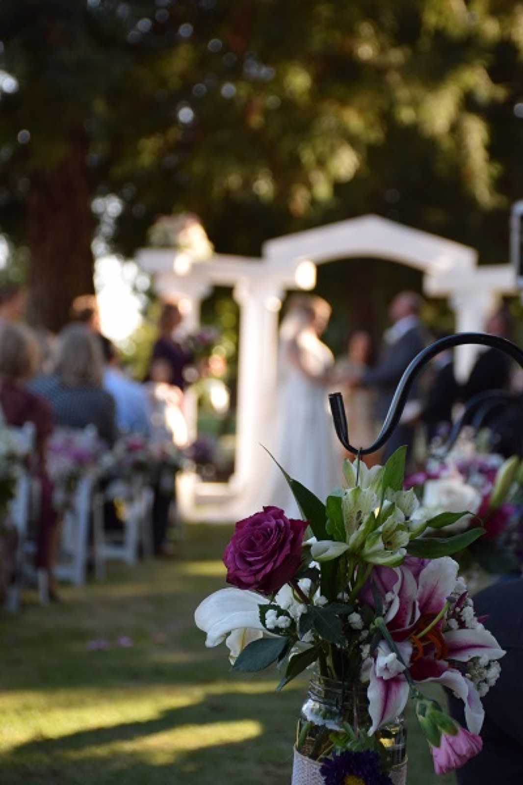 Floral-lined wedding ceremony aisle at Elkhorn Banquets in Stockton, California