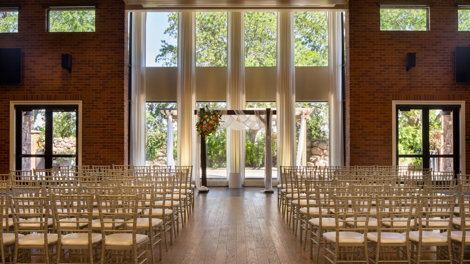 Indoor ceremony in the Grand Hall at Evergreen Springs by Wedgewood Weddings in Elk Grove, CA