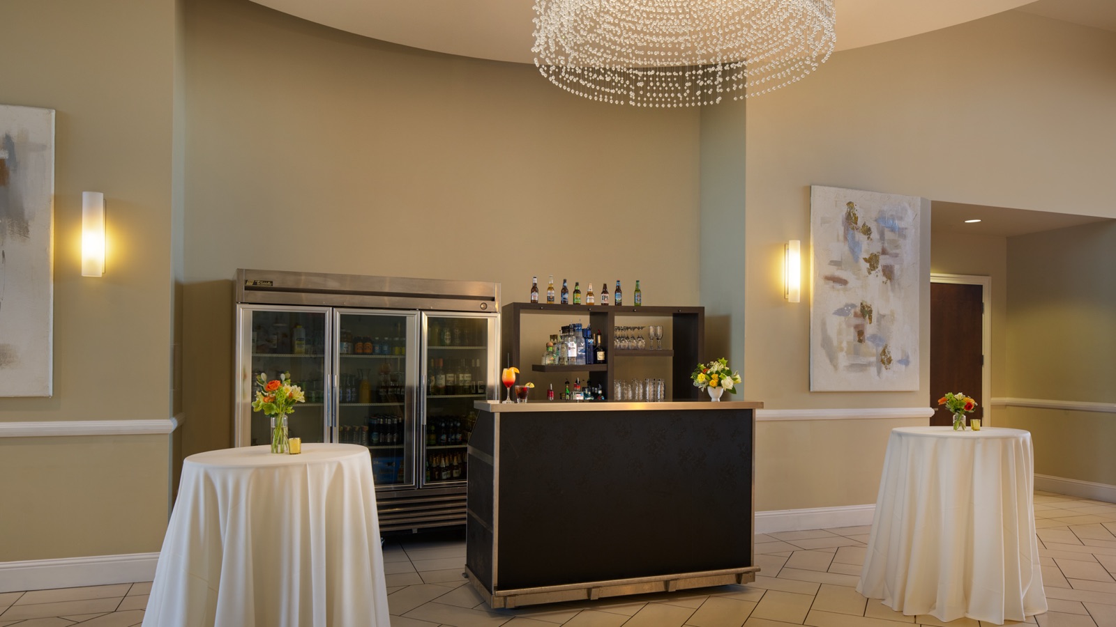 Chandelier-lit lobby set for cocktail hour at Evergreen Springs by Wedgewood Weddings in Elk Grove, CA