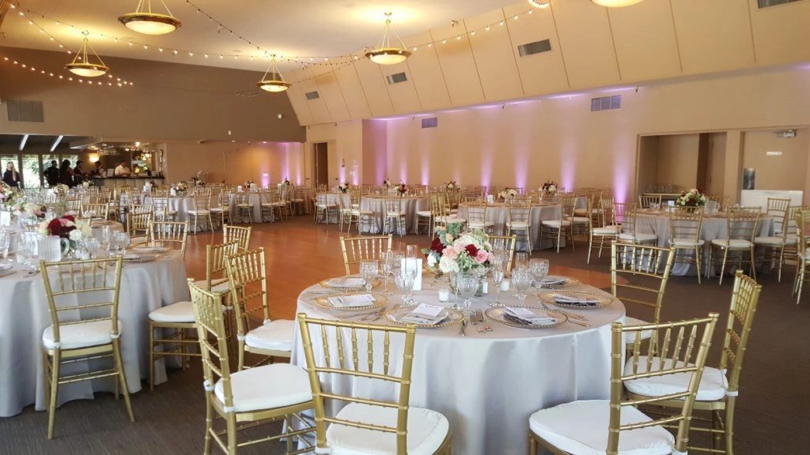 Banquet tables set for a celebration at Gilroy Lodge on the Hill wedding venue in Gilroy, California