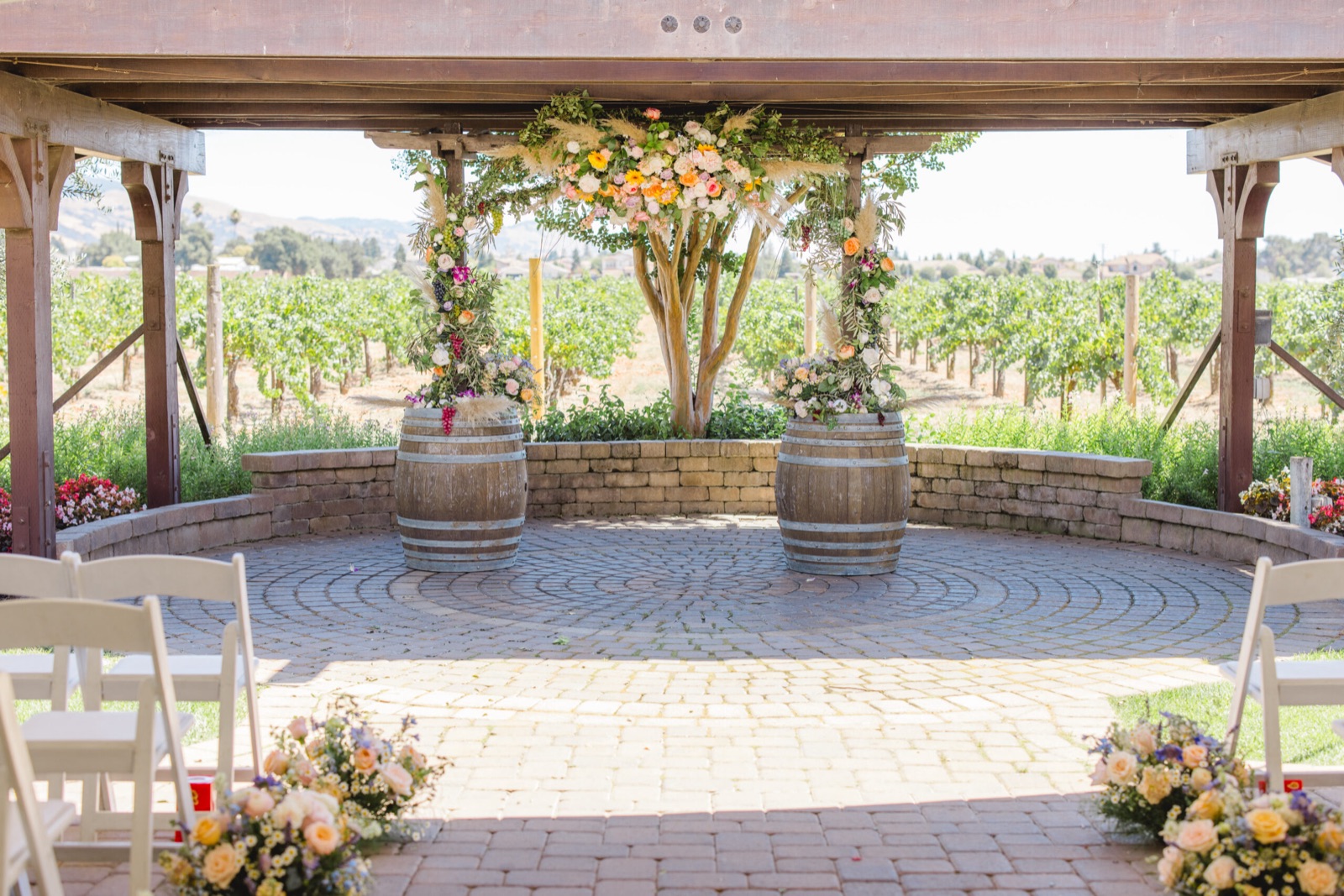 Outdoor vineyard ceremony setup at Guglielmo Winery wedding venue in Morgan Hill, California