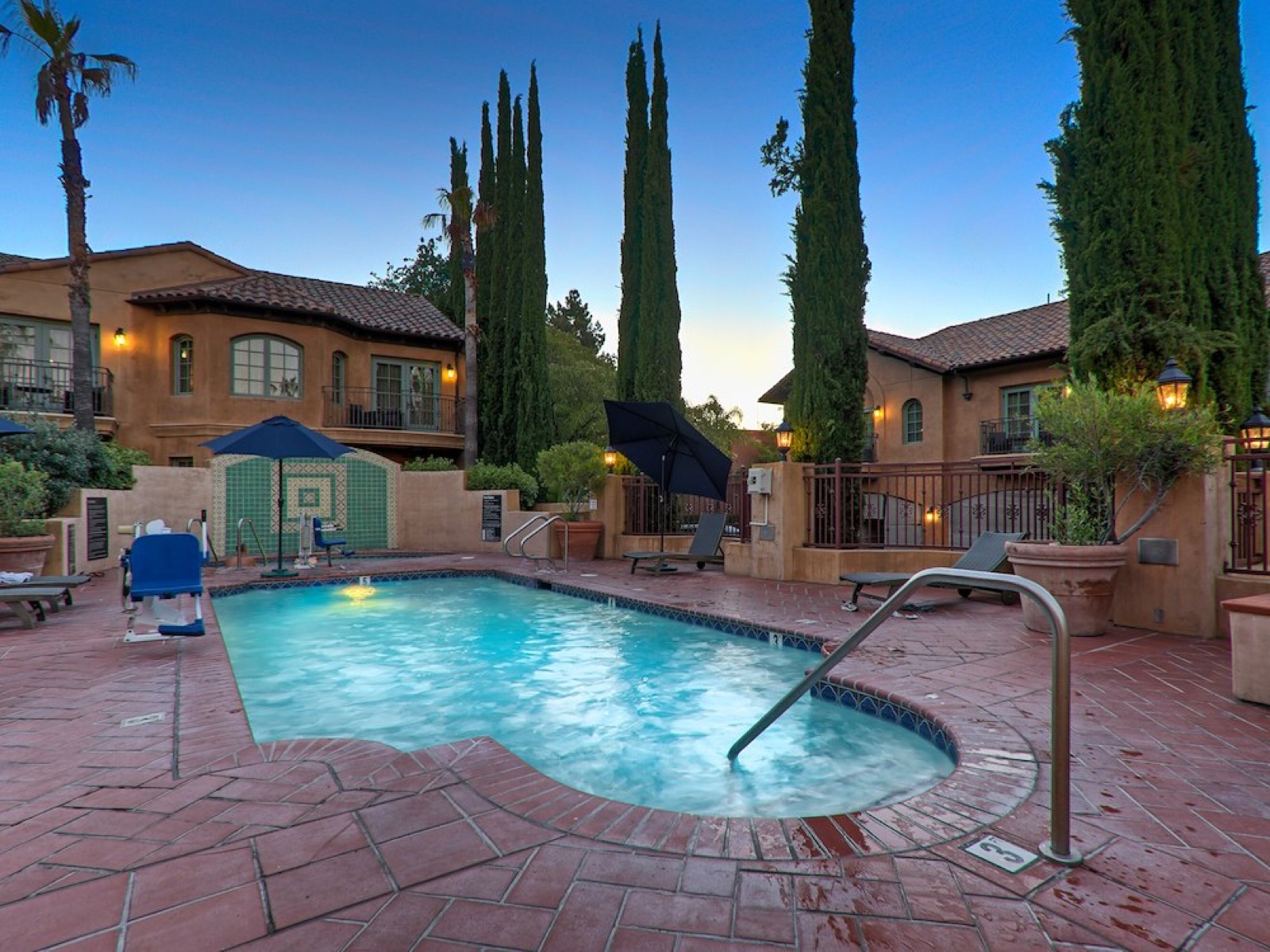 Outdoor pool area with relaxing amenities at Hotel Los Gatos in Los Gatos, California
