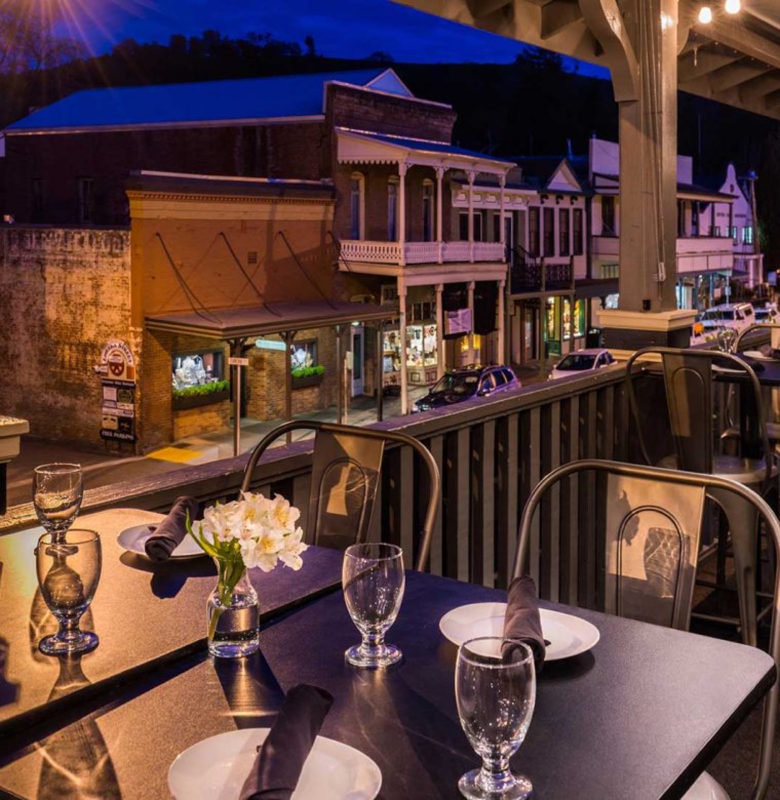 Evening balcony dining overlooking Main Street at Hotel Sutter in Sutter Creek, CA