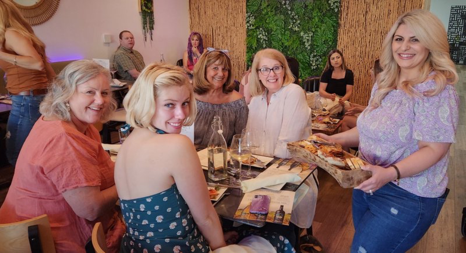 Floral mural and decor inside L'Amore venue in Turlock, California