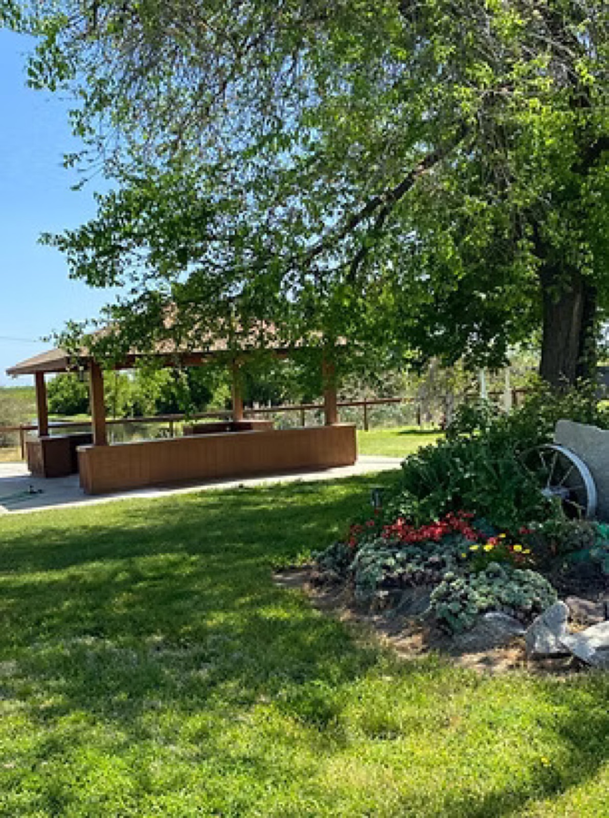 Pond and pergola at Ortega Ranch Park wedding venue in Winton, California