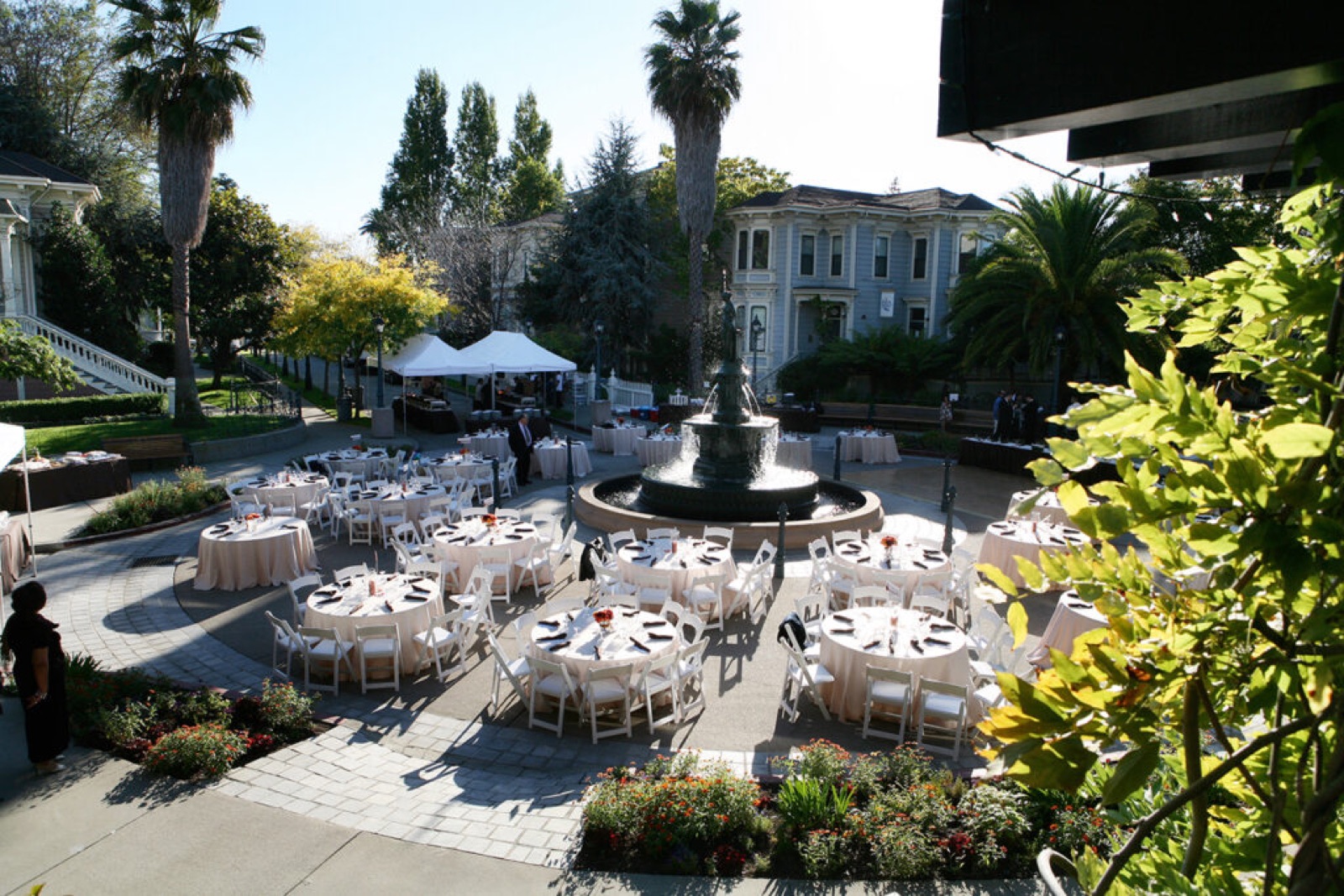 Wedding celebration on the grounds of Preservation Park venue in Oakland, California