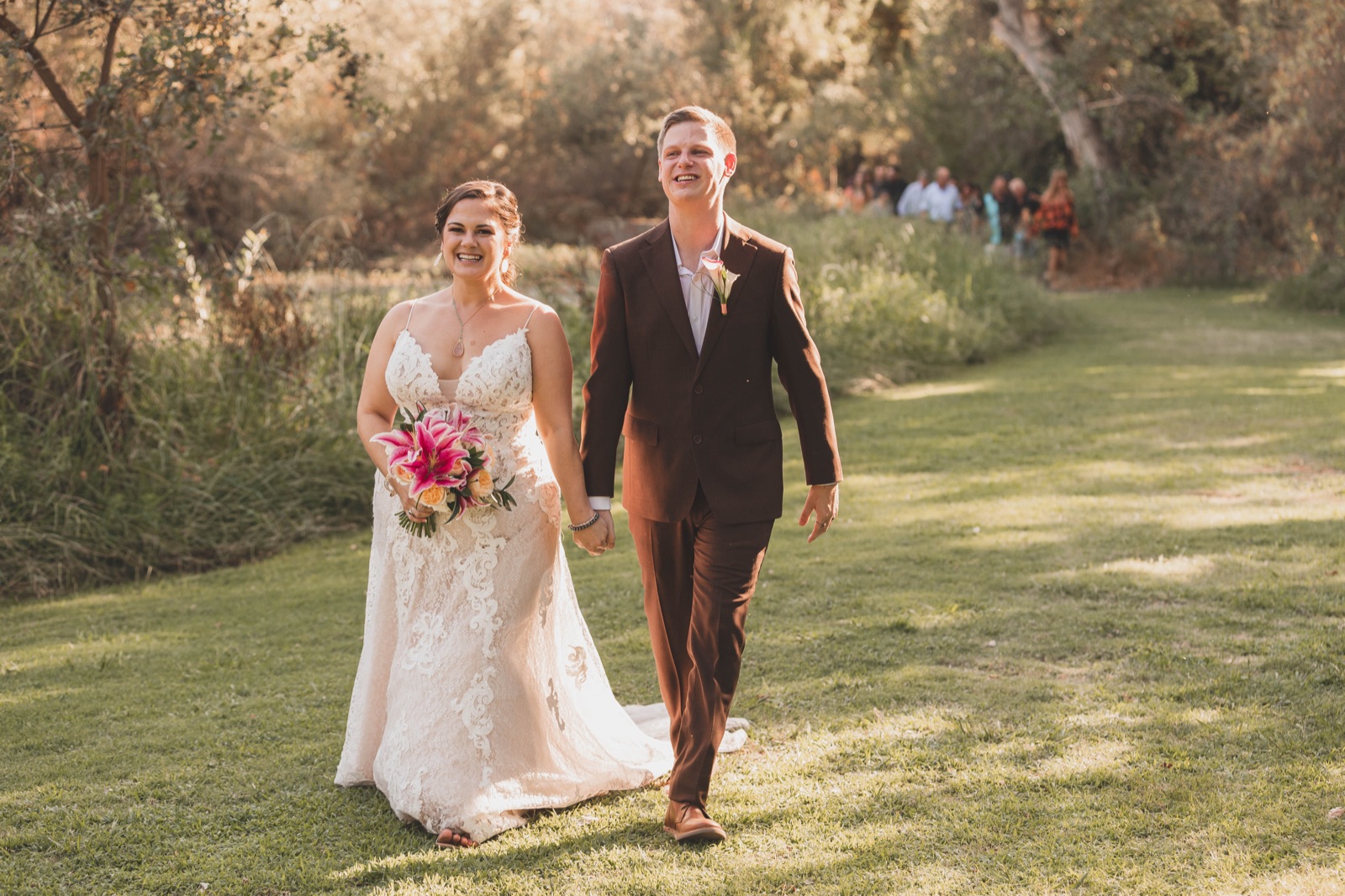 Wedding ceremony on the manicured lawn at River Bottom Ranch in Sanger, California