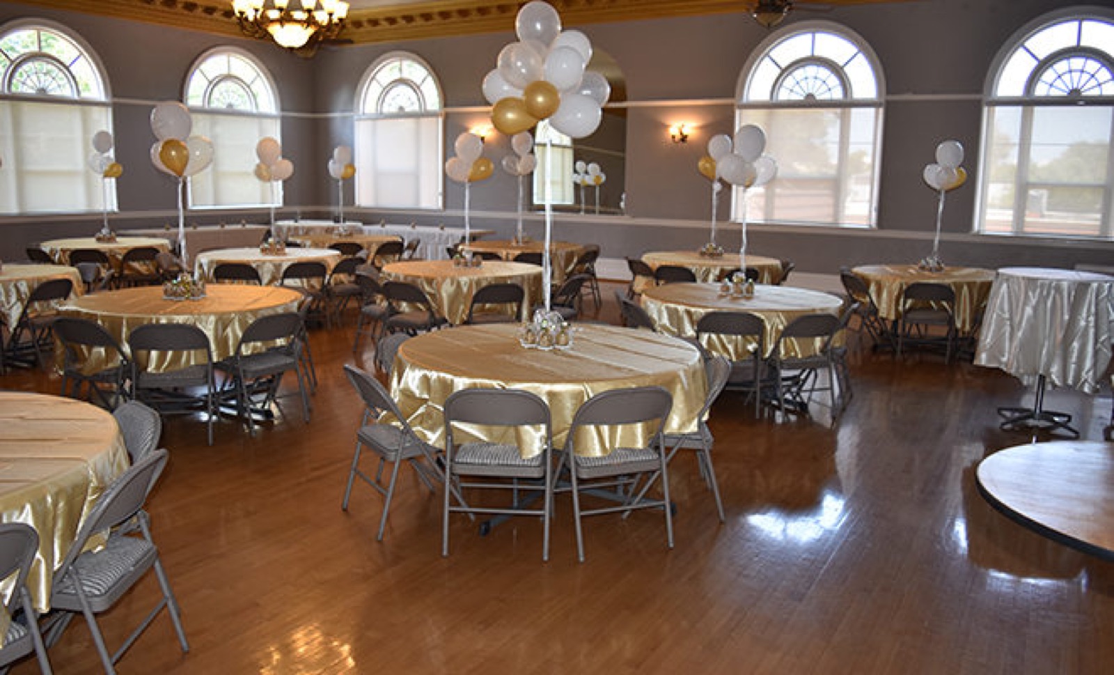 Banquet Hall with arched windows and crown molding at Sacramento Turn Verein, Sacramento, CA