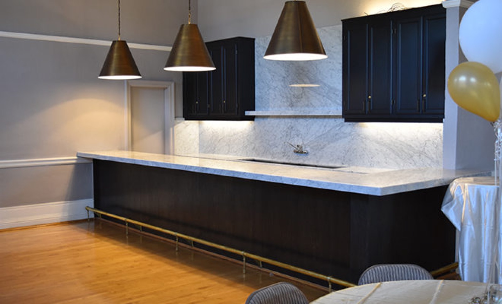 Hardwood floors and bar area in the Banquet Hall at Sacramento Turn Verein in Sacramento, California