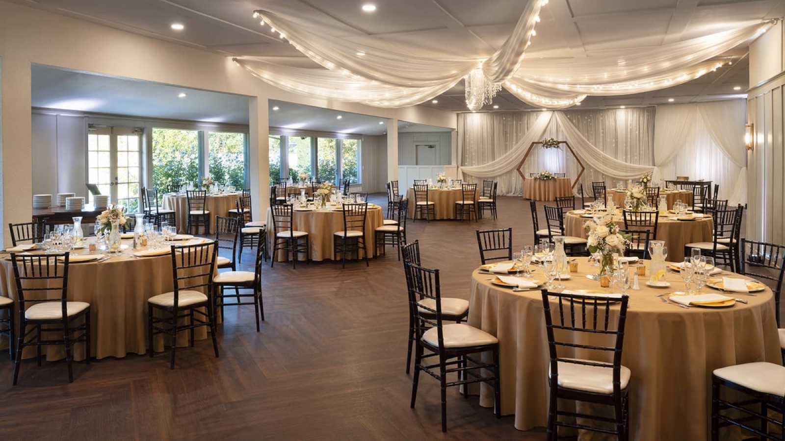 Indoor Grand Hall reception with crystal chandelier and draped ceiling at San Ramon Golf Club, San Ramon, California