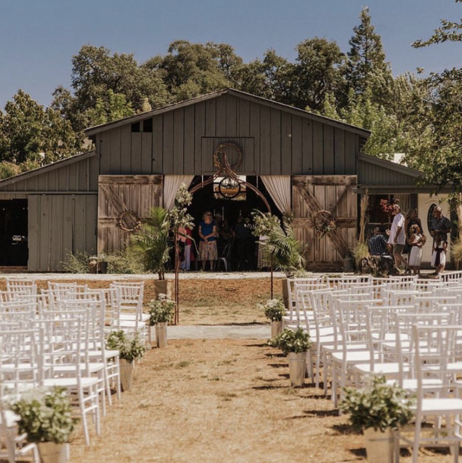 The rustic barn and patio at Savanna Gardens at The Barn wedding venue in Sonora, California
