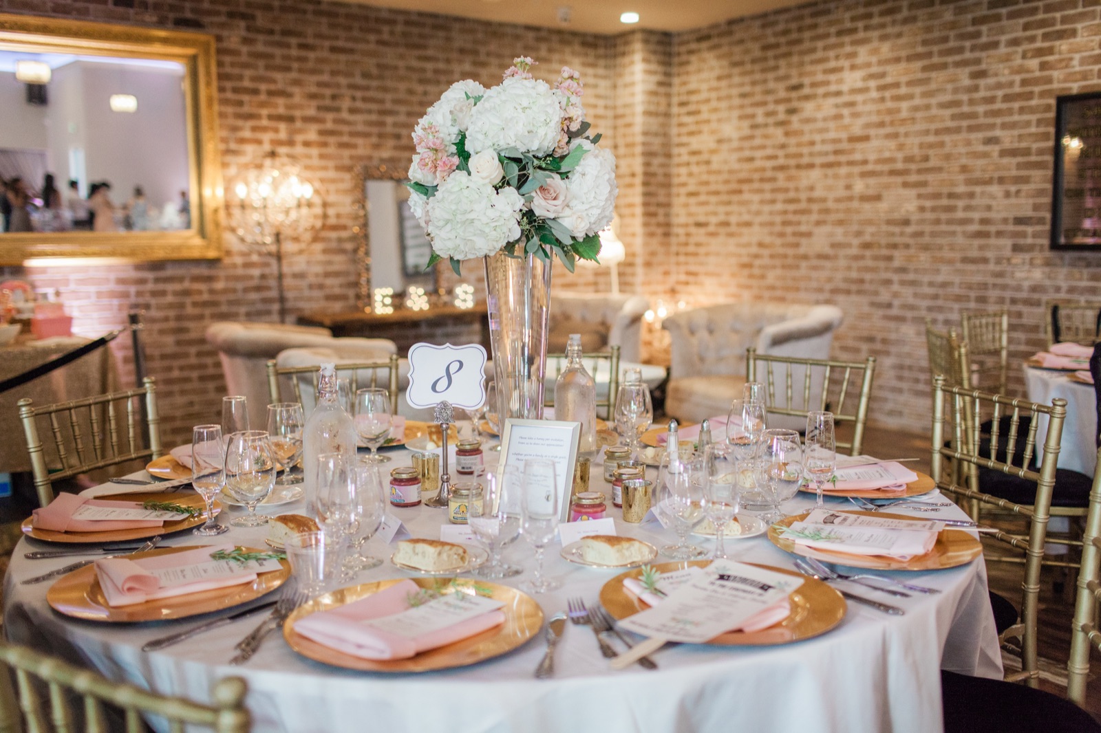 Rustic-elegant reception hall set for dinner at Sunol's Casa Bella in Sunol, California