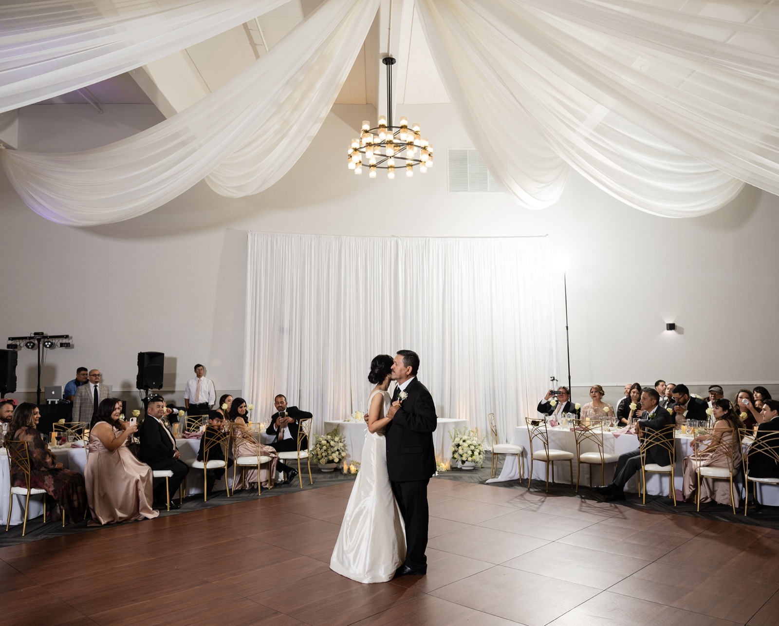 Ballroom-style event space with chandeliers at The Palomino Event Center in Fresno, California