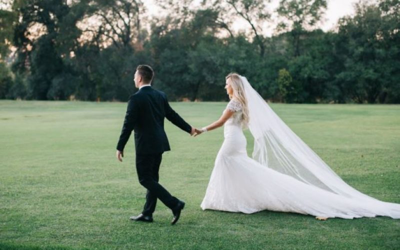 Couple on the golf course grounds at The Pavilion at Haggin Oaks in Sacramento, California