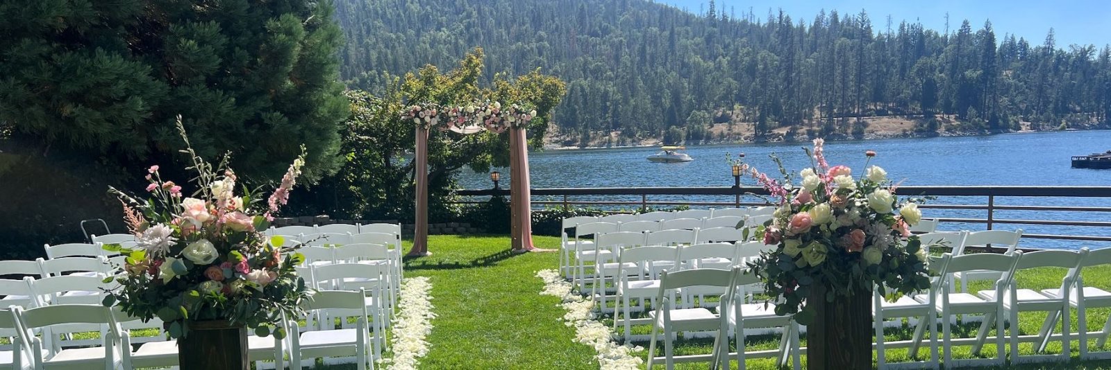 Wedding ceremony aisle on the gazebo lawn at The Pines Resort, Bass Lake, California