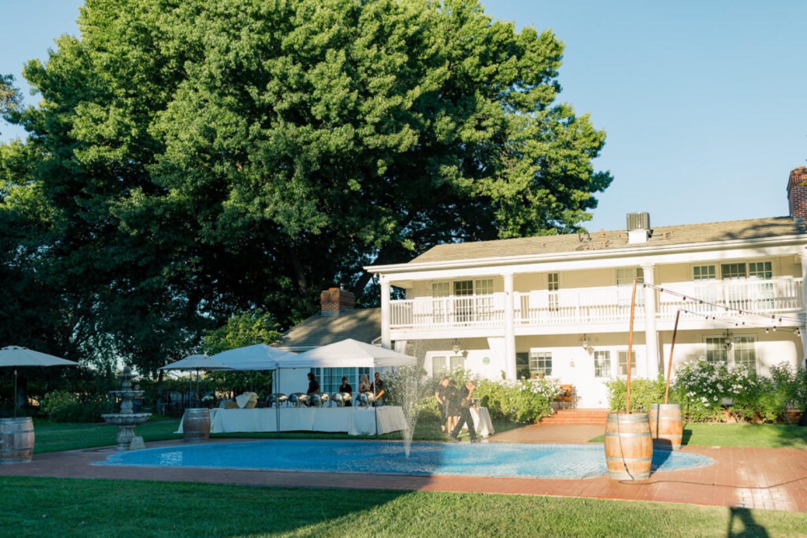 Landscaped garden ceremony setting at TULU Vineyards wedding venue in Galt, California
