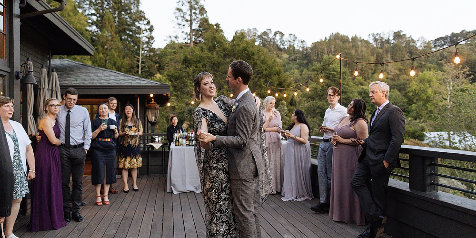 Couple dancing on the Julia Morgan Hall deck at UC Botanical Garden at Berkeley in Berkeley, California