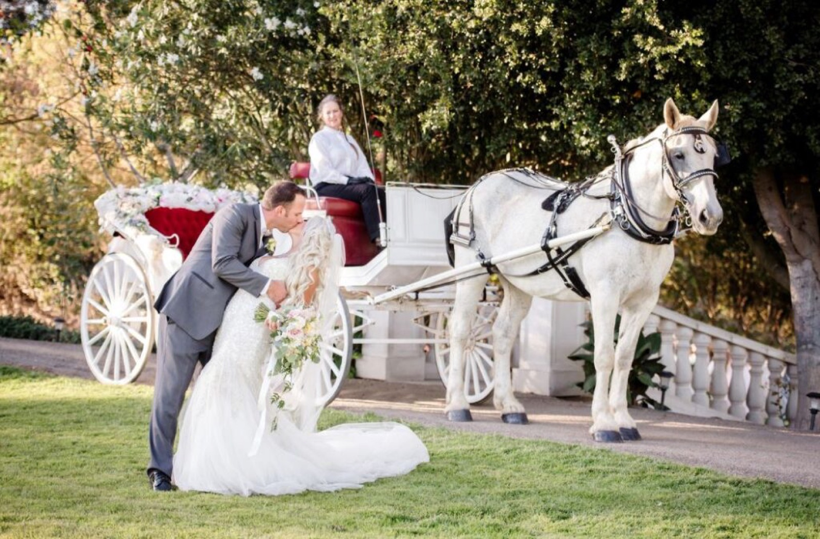 Horse-drawn carriage on the vineyard grounds at Viaggio Estate & Winery in Acampo, California