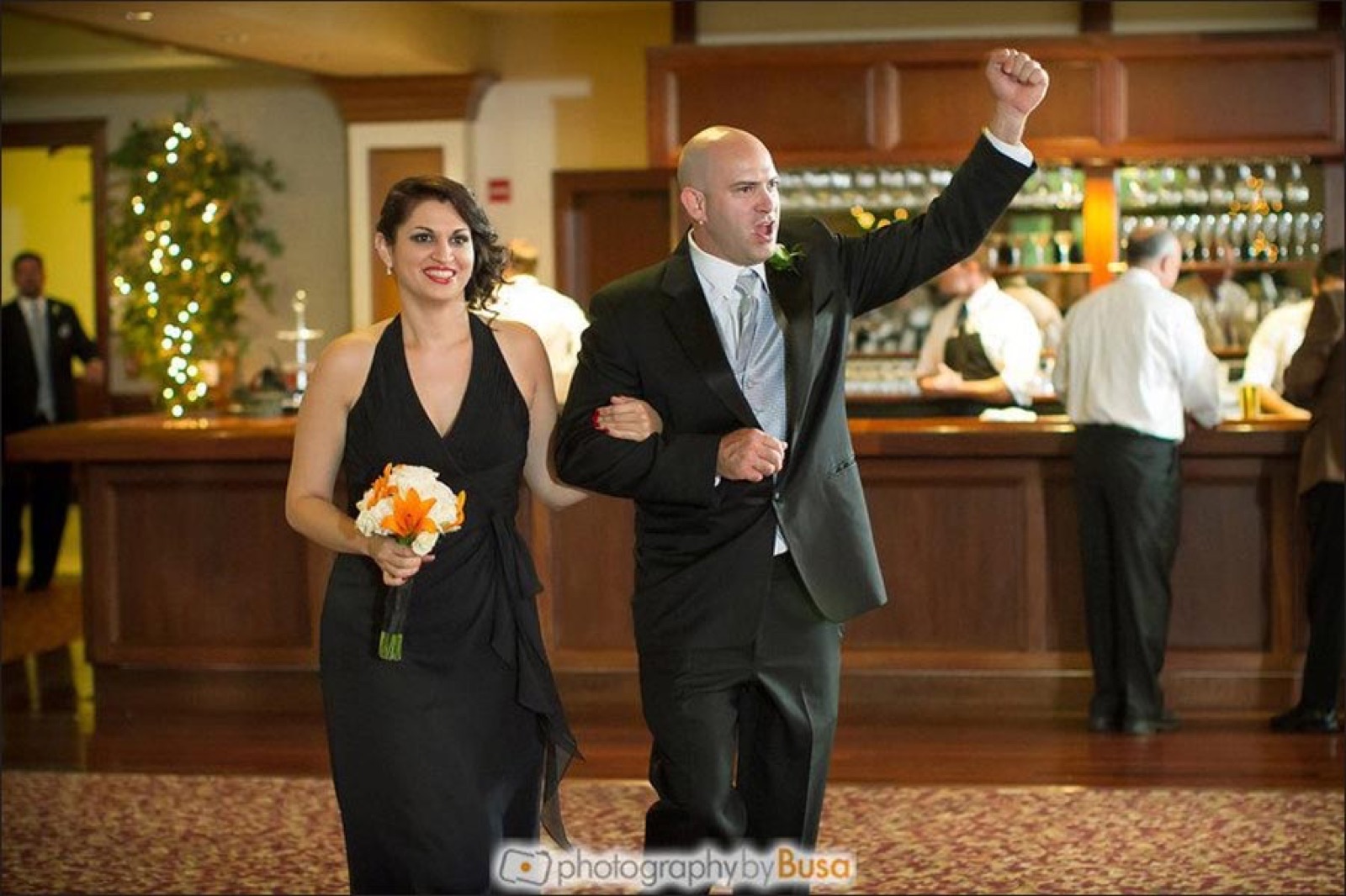 Wedding couple at the mahogany bar at Villa Ragusa in Campbell, California