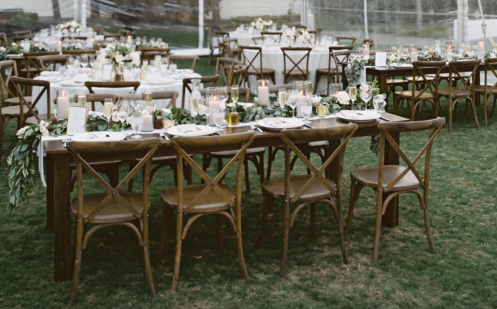 Wedding reception space with table settings at Wente Vineyards in Livermore, California